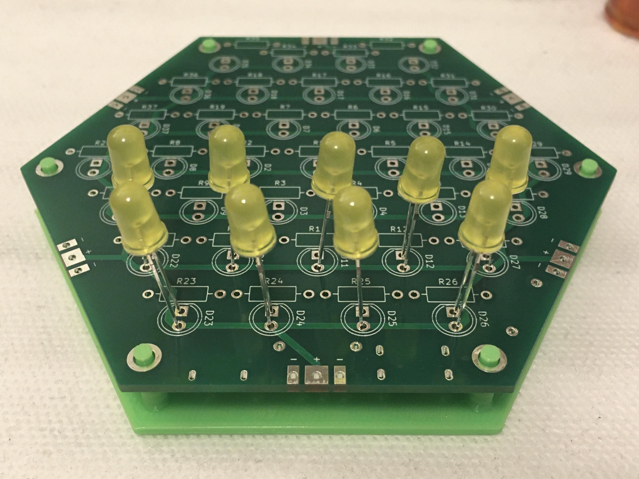 LEDs inserted with the stand holding the board
